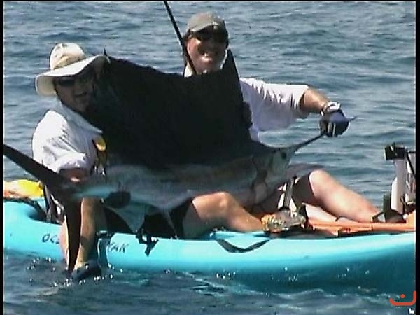 Adrian with 80 pound sail